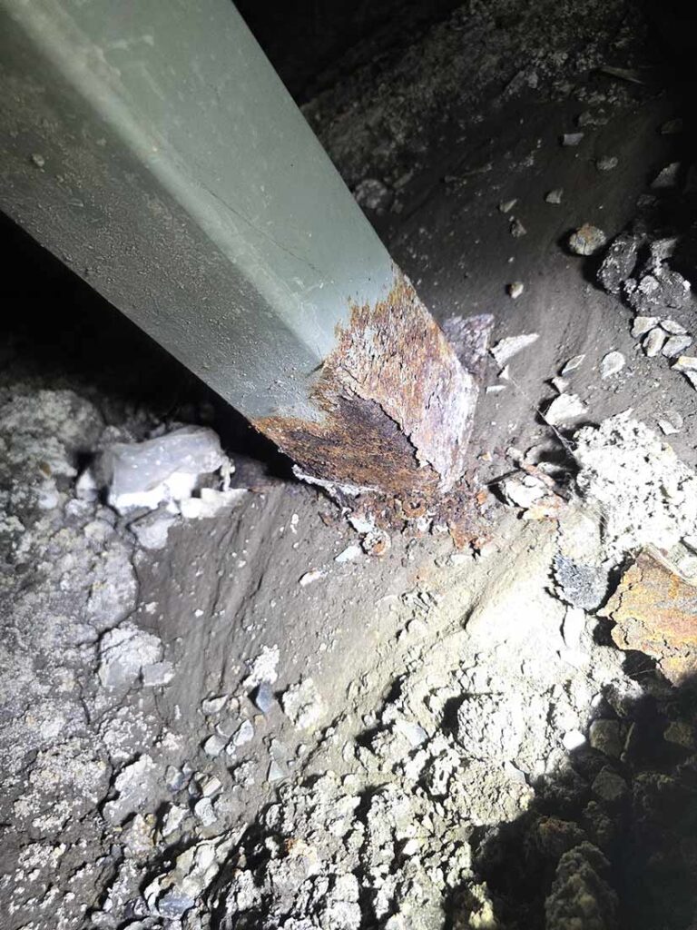 Rust damage at steel post base found during Hobart building inspection